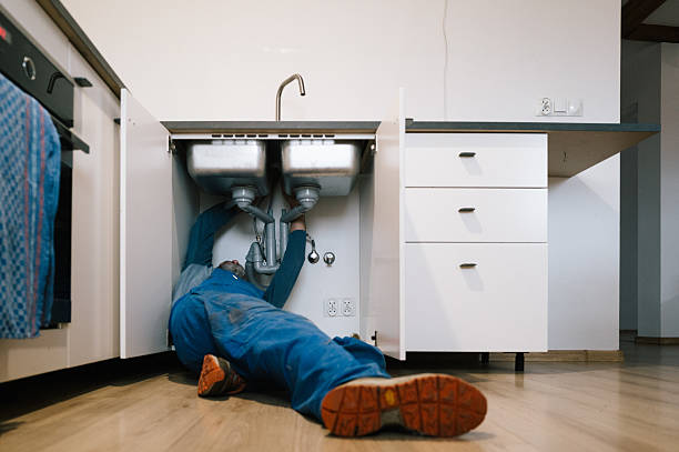 Professional Plumbing technician working in Deatsville, AL